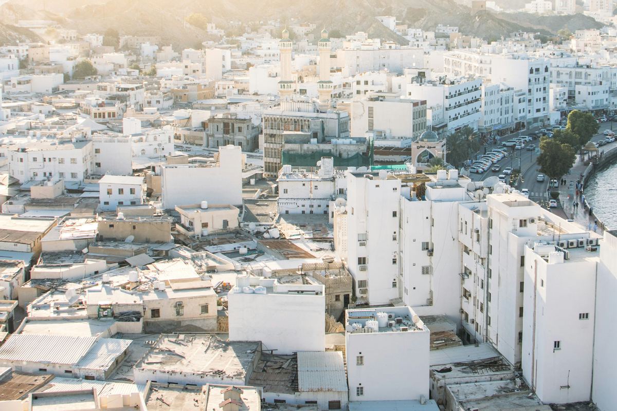 Muscat, Oman: white buildings in the old town near the bay